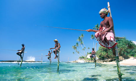 Sea fisherman on a Sri Lankan beach. Photograph: Alamy