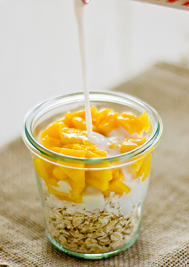 almond_milk_poured_into_overnight_oats