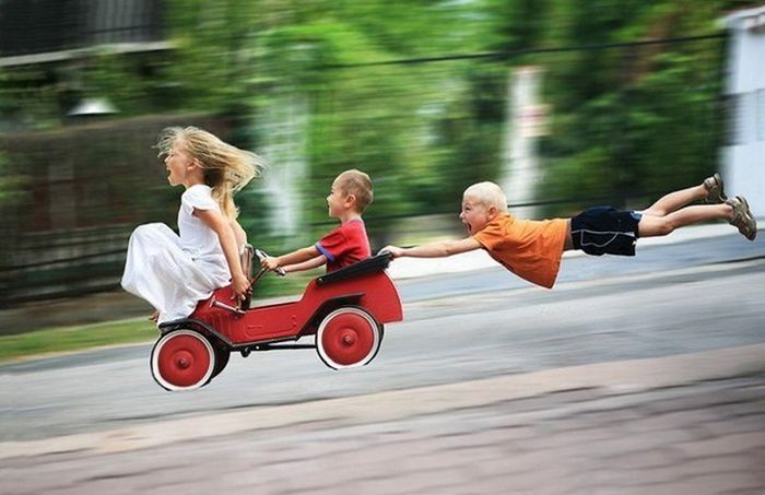 children-down-hill-having-fun