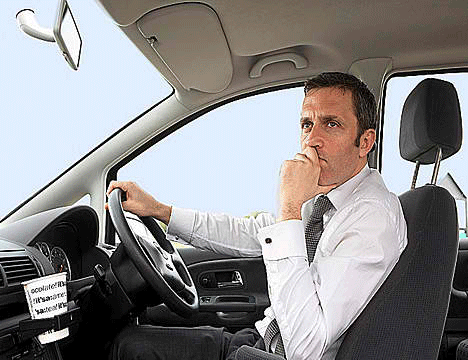 Man_driving-car_110410