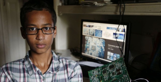 Irving MacArthur High School student Ahmed Mohamed, 14, poses for a photo at his home in Irving, Texas on Tuesday, Sept.  15, 2015. Mohamed was arrested and interrogated by Irving Police officers on Monday after bringing a homemade clock to school. Police don't believe the device is dangerous, but say it could be mistaken for a fake explosive. He was suspended from school for three days, but he has not been charged. (Vernon Bryant/The Dallas Morning News via AP) MANDATORY CREDIT; MAGS OUT; TV OUT; INTERNET USE BY AP MEMBERS ONLY; NO SALES