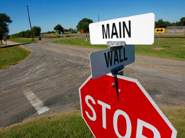stop-sign-intersection-wall-street-main-street