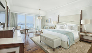 dubai_palm_deluxe_suite_bedroom_with_view_fp