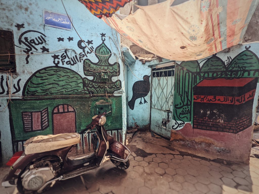Hand-painted hajj mural in Cairo. Hajj house painting.