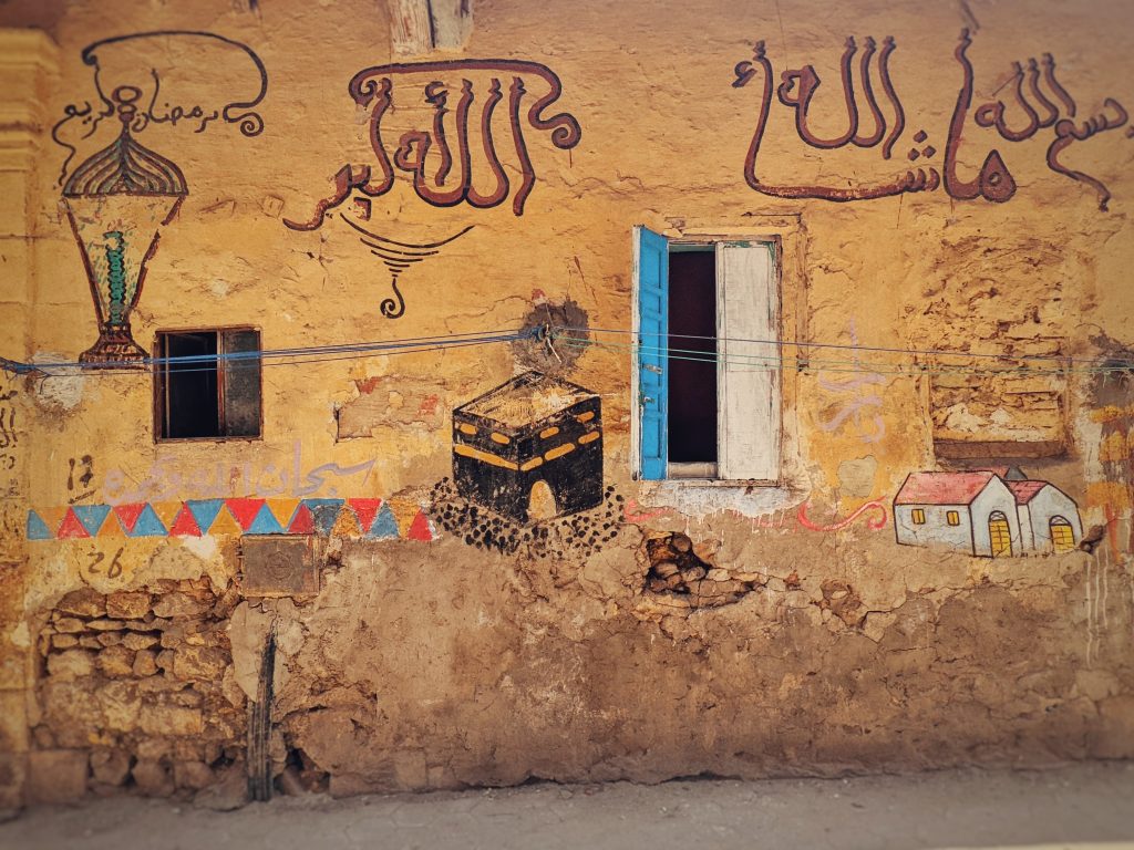 Hand-painted hajj mural in Cairo. Hajj house painting.