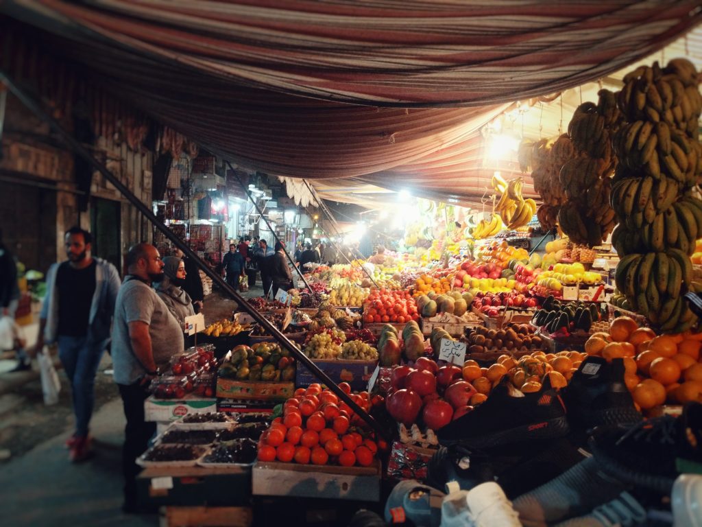 Comparison of fruit and vegetable market with an up-market supermarket.